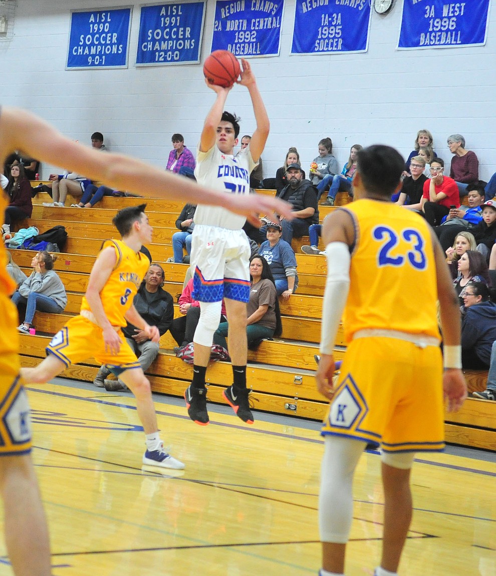 Chino Valley's Daniel Martinez shoots a three-pointer as they face the Kingman Bulldogs Thursday, Jan. 24, 2019 in Chino Valley. (Les Stukenberg/Courier).