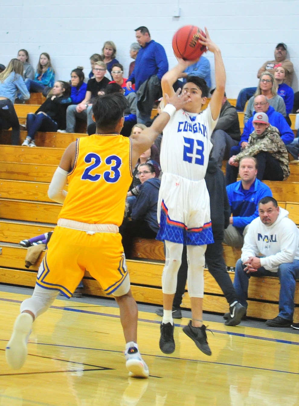 Chino Valley's Jayden Torres shoots a long two-pointer as they face the Kingman Bulldogs Thursday, Jan. 24, 2019 in Chino Valley. (Les Stukenberg/Courier).