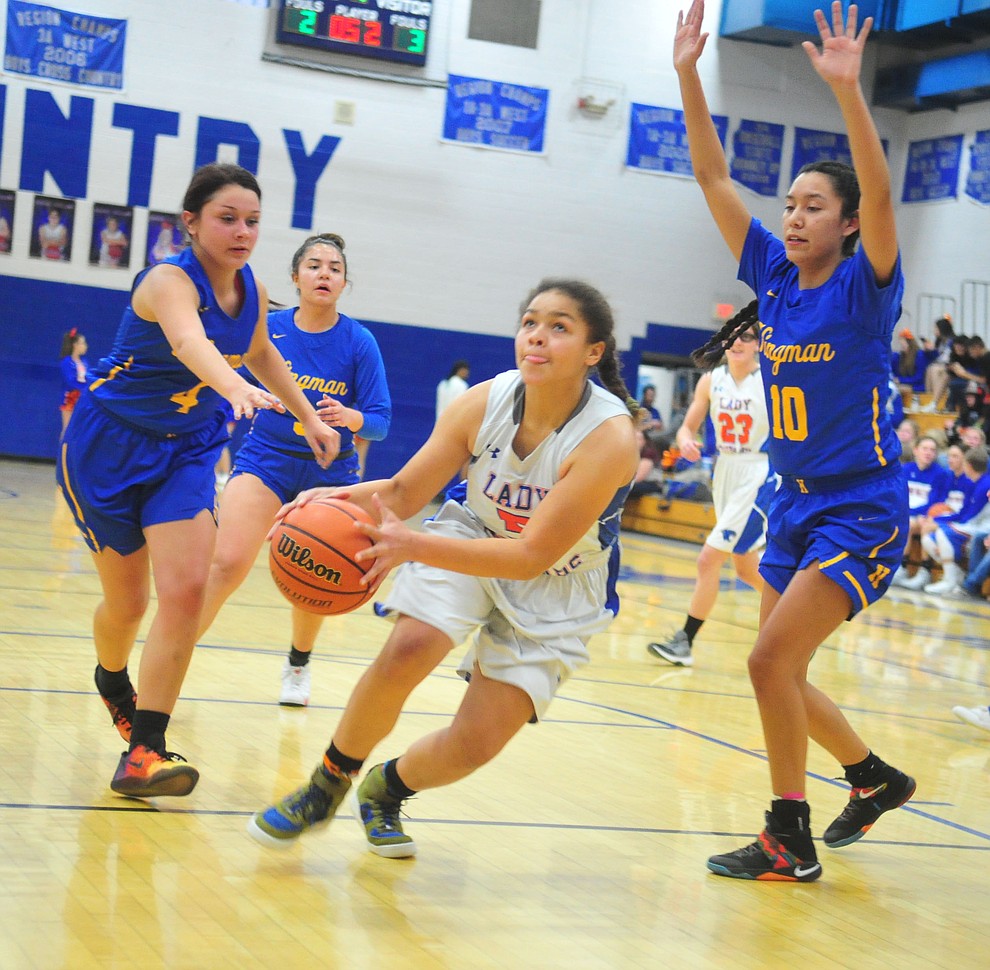 Chino Valley's Trinity Tomkins drives into the lane as they face the Kingman Bulldogs Thursday, Jan. 24, 2019 in Chino Valley. (Les Stukenberg/Courier).