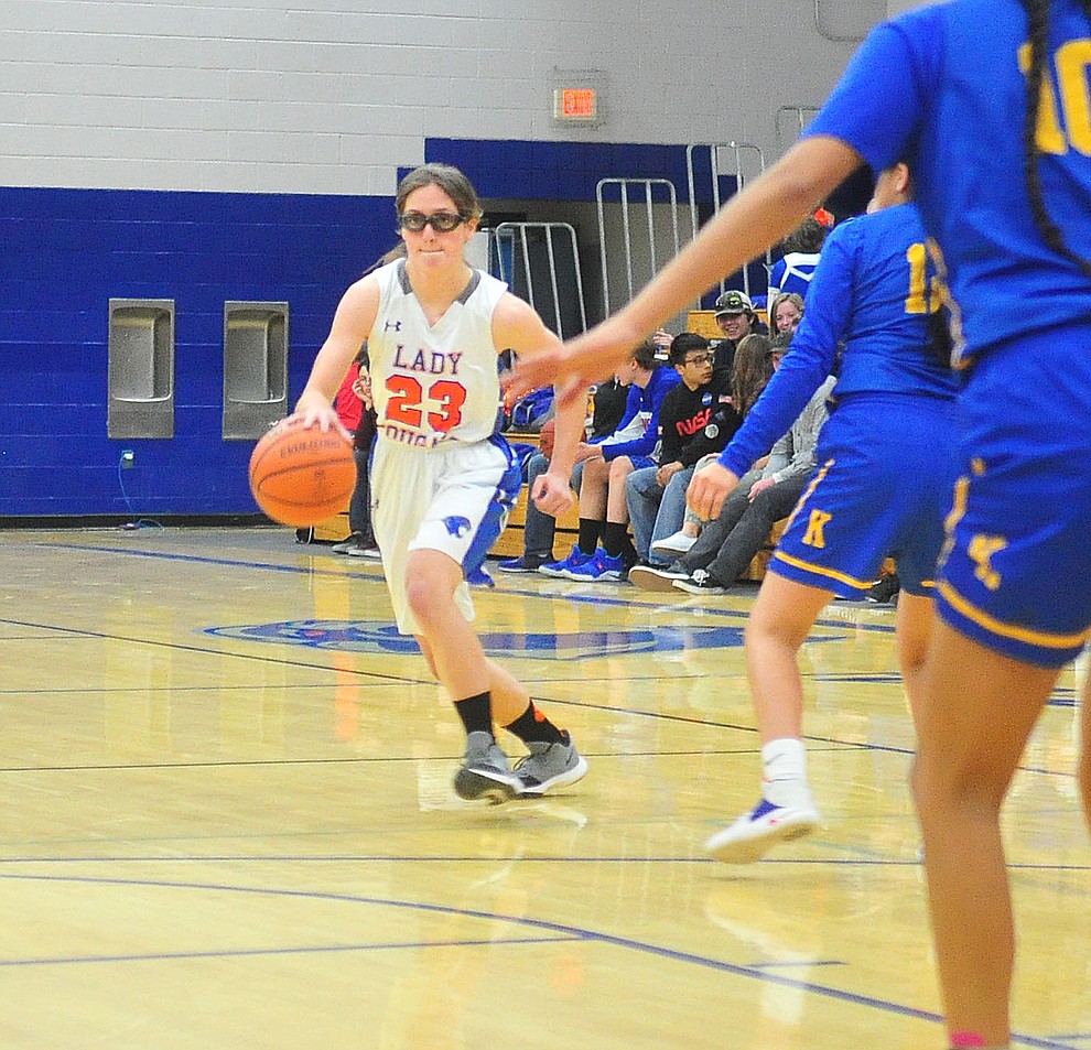 Chino Valley's Abbie Golden brings the ball upcourt as they face the Kingman Bulldogs Thursday, Jan. 24, 2019 in Chino Valley. (Les Stukenberg/Courier).