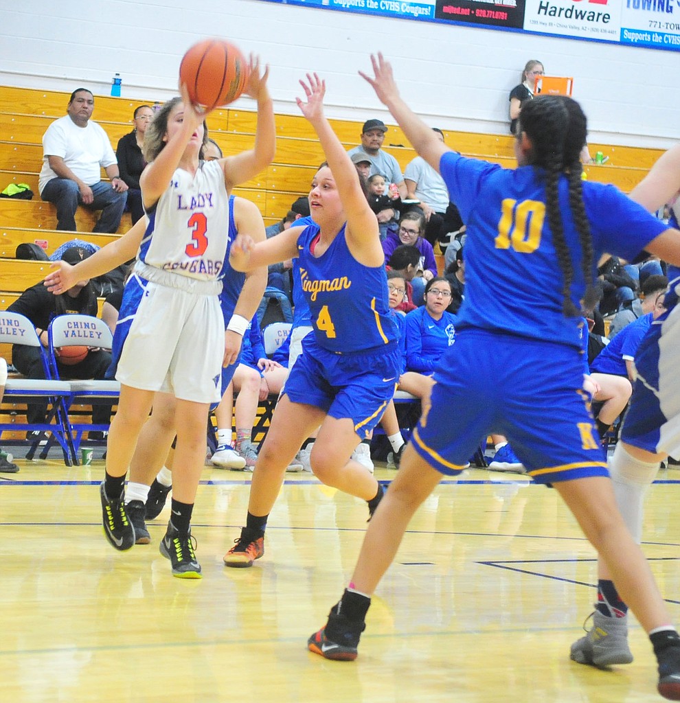 Chino Valley's Coury Hawks takes a contested jump shot as they face the Kingman Bulldogs Thursday, Jan. 24, 2019 in Chino Valley. (Les Stukenberg/Courier).