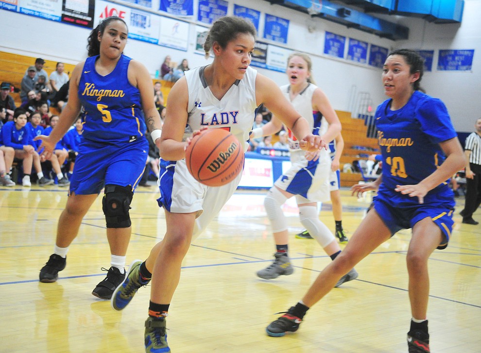 Chino Valley's Trinity Tomkins drives the baseline as they face the Kingman Bulldogs Thursday, Jan. 24, 2019 in Chino Valley. (Les Stukenberg/Courier).