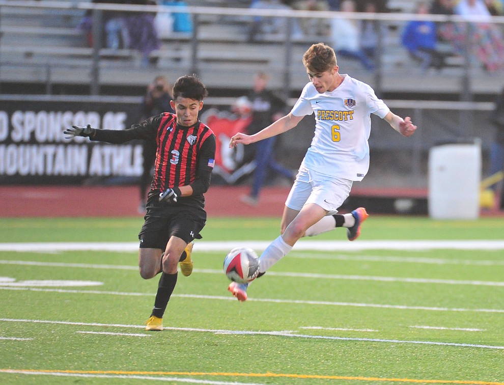 Prescott's Cade Tutrone takes a shot on goal as the Badgers play the Bradshaw Mountain Bears Tuesday, Jan. 29, 2019 in Prescott Valley. (Les Stukenberg/Courier).