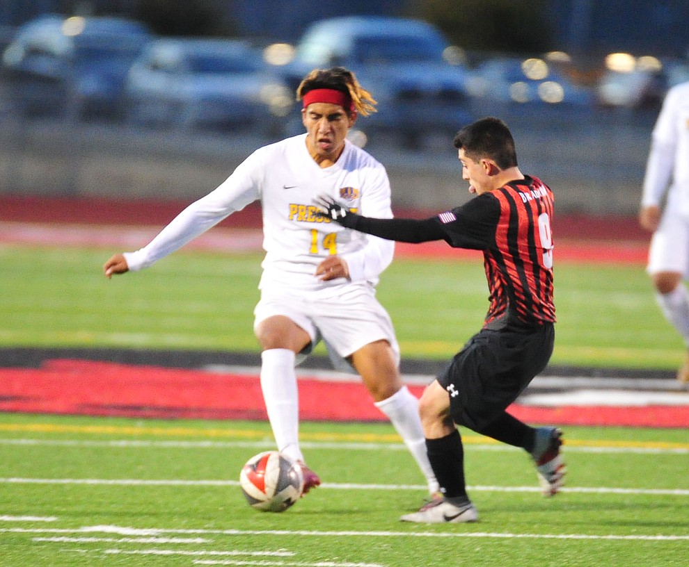 Prescott's Fernando Rodriguez brings the ball upfield as the Badgers play the Bradshaw Mountain Bears Tuesday, Jan. 29, 2019 in Prescott Valley. (Les Stukenberg/Courier).