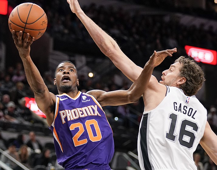 Phoenix Suns' Josh Jackson (20) shoots against San Antonio Spurs' Pau Gasol during the first half of an NBA basketball game, Tuesday, Jan. 29, 2019, in San Antonio. (Darren Abate/AP)