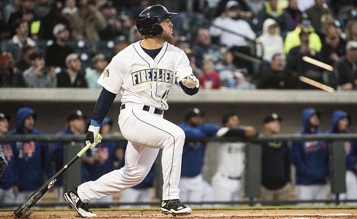 Columbia Fireflies' Tim Tebow watches his home run in his first at bat on the opening day during a Class A minor league baseball game against the Augusta GreenJackets on Thursday, April 6, 2017, in Columbia, S.C. (Sean Rayford/AP)