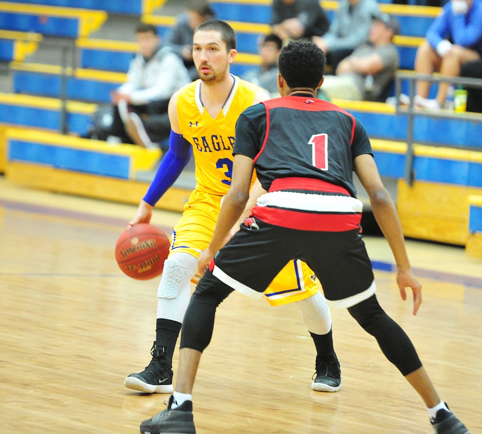 Embry Riddle's Ryan Skurdal looks to run a play as the Eagles take on the Simpson University Redhawks Thursday, Jan. 31, 2019 in Prescott. (Les Stukenberg/Courier).