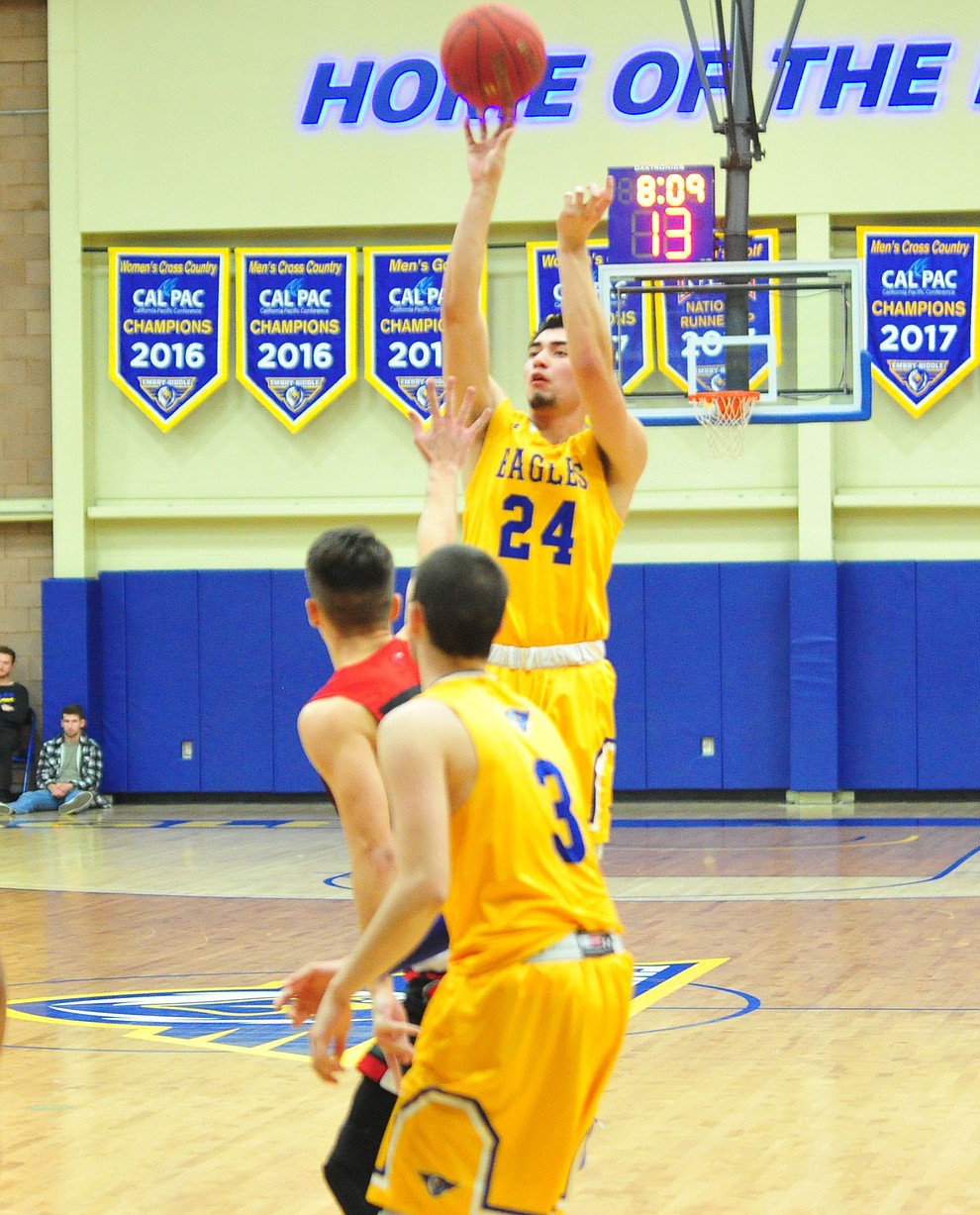 Embry Riddle's Gilbert Ibarra sends up a three-pointer as the Eagles take on the Simpson University Redhawks Thursday, Jan. 31, 2019 in Prescott. (Les Stukenberg/Courier).