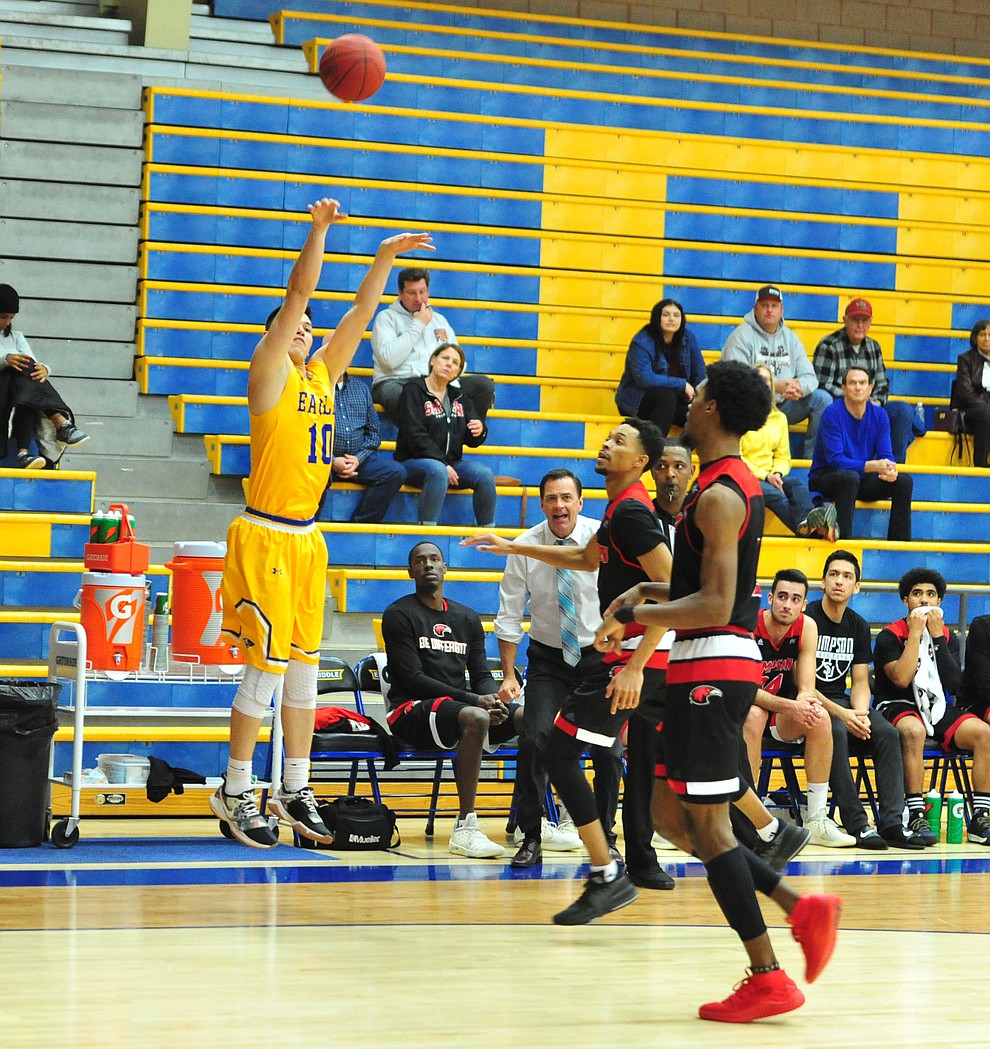 Embry Riddle's Sean Wood launches a three-pointer as the Eagles take on the Simpson University Redhawks Thursday, Jan. 31, 2019 in Prescott. (Les Stukenberg/Courier).