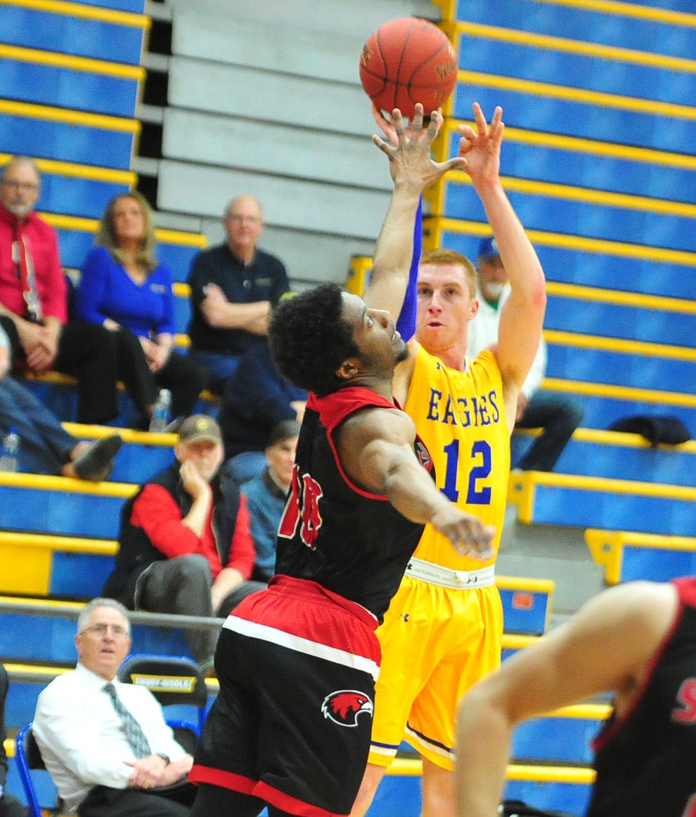 Embry Riddle's Nick Johnson sends up a three-pointer as the Eagles take on the Simpson University Redhawks Thursday, Jan. 31, 2019 in Prescott. (Les Stukenberg/Courier).
