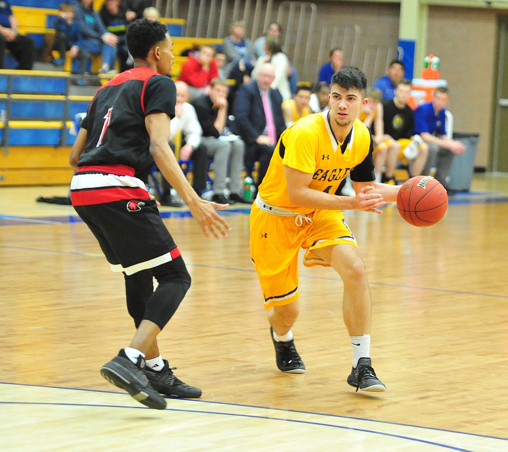 Embry Riddle's Logan Skurdal starts to drive as the Eagles take on the Simpson University Redhawks Thursday, Jan. 31, 2019 in Prescott. (Les Stukenberg/Courier).
