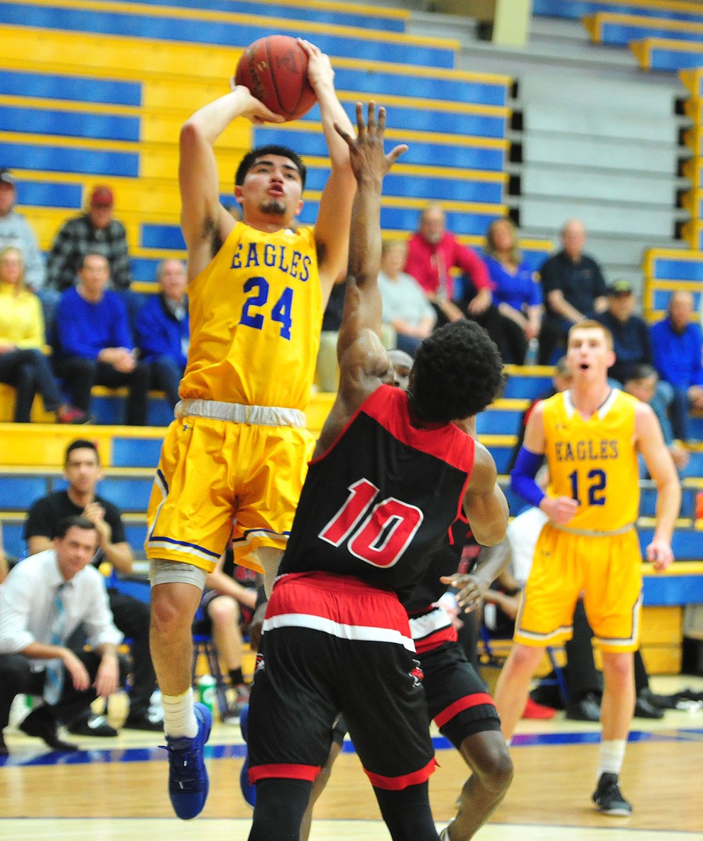 Embry Riddle's Gilbert Ibarra goes up for a shot late in the first half as the Eagles take on the Simpson University Redhawks Thursday, Jan. 31, 2019 in Prescott. (Les Stukenberg/Courier).