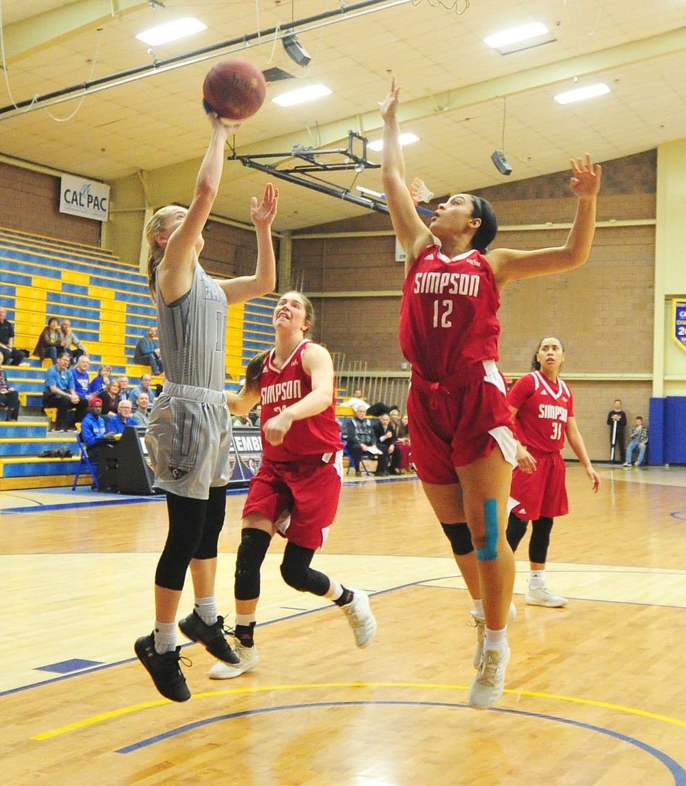 Embry Riddle's Amber Rollins takes a shot in the paint as the Eagles take on the Simpson University Redhawks Thursday, Jan. 31, 2019 in Prescott. (Les Stukenberg/Courier).
