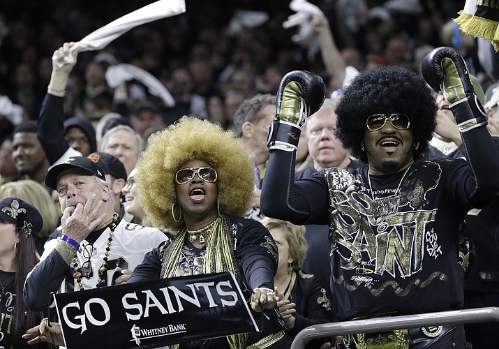 Fans cheer during the first half of the NFL football NFC championship game between the New Orleans Saints and the Los Angeles Rams Sunday, Jan. 20, 2019, in New Orleans. (David J. Phillip/AP)