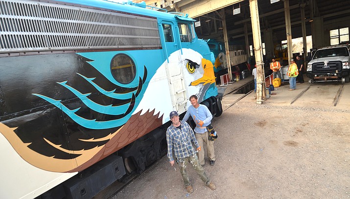 John Alvey, right, of Cottonwood and Whitey Thompson of Waseca, Minn., finish up their eagle project at the Verde Canyon Railroad roundhouse in Clarkdale on Thursday. VVN/Vyto Starinskas