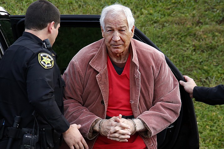 In this Oct. 29, 2015, file photo, former Penn State University assistant football coach Jerry Sandusky arrives for an appeal hearing at the Centre County Courthouse in Bellefonte, Pa. Sandusky lost a bid for a new trial Tuesday, Feb. 5, 2019, but a Pennsylvania appeals court ordered him to be re-sentenced for a 45-count child molestation conviction. Superior Court on Tuesday said Sandusky was improperly sentenced using mandatory minimums. The 75-year-old former Penn State assistant football coach was sentenced in 2012 to 30 to 60 years in state prison for sexual abuse of 10 boys. (Gene J. Puskar/AP, File)