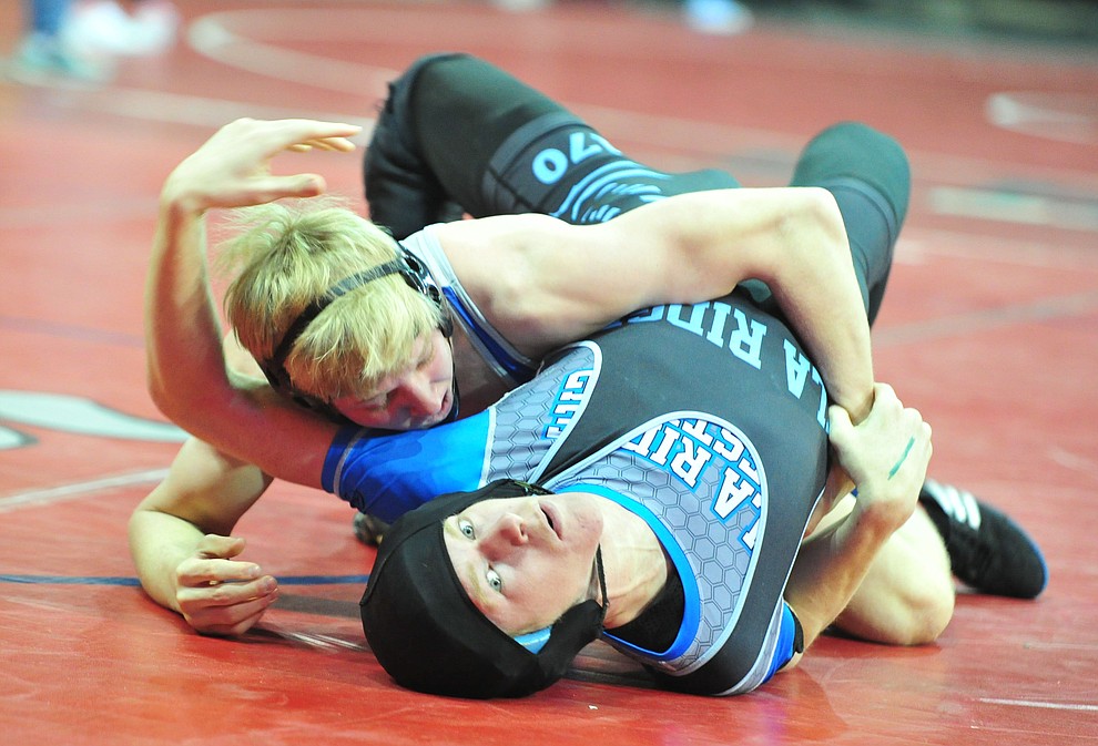 Chino Valley's Keller Rock defeats Gila Ridge's Justin Rhodes by pin during the first round of the Arizona Interscholastic Association Division 3 State Wrestling Tournament Thursday, Feb. 7, 2019 at the Findlay Toyota Center in Prescott Valley. (Les Stukenberg/Courier).