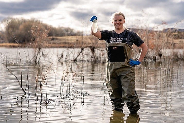 Embry-Riddle student Courtney Turner-Rathbone collects water samples from the Verde River Jan. 16 for an ecological survey project that led to a new method of identifying fish, reptiles, amphibians, birds and mammals through DNA sequencing. (Courtesy)