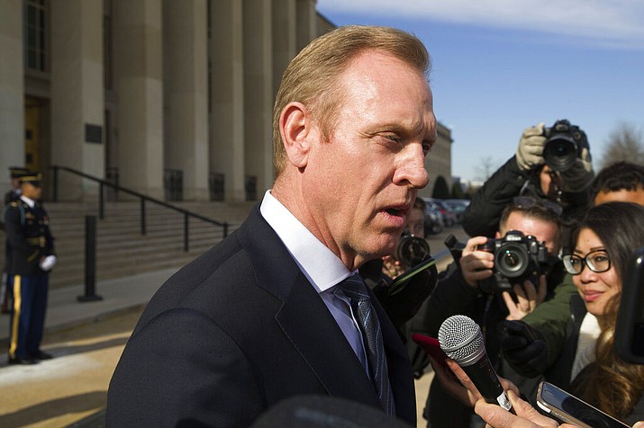 In this Jan. 28, 2019, file photo, acting Defense Secretary Pat Shanahan speaks with the media as he waits for the arrival of NATO Secretary General Jens Stoltenberg at the Pentagon in Washington. The Pentagon's top official, Shanahan, has arrived in Afghanistan to meet with U.S. commanders and Afghan leaders amid a push for peace with the Taliban. (AP Photo/Alex Brandon, File