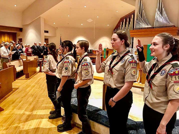 The Valkyries take the scout’s oath and become the first girl troop to join Scouting BSA. (George Johnston/Courier)