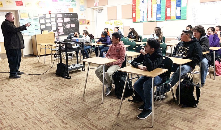 Students at Crownpoint Middle School listen to instructors and staff members from Navajo Technical University about the benefits of attending the technical tribal institution. With recent expansions in programs and locations, potential students are encouraged to come to NTU and learn about the programs available. (Photo/Navajo Technical University)