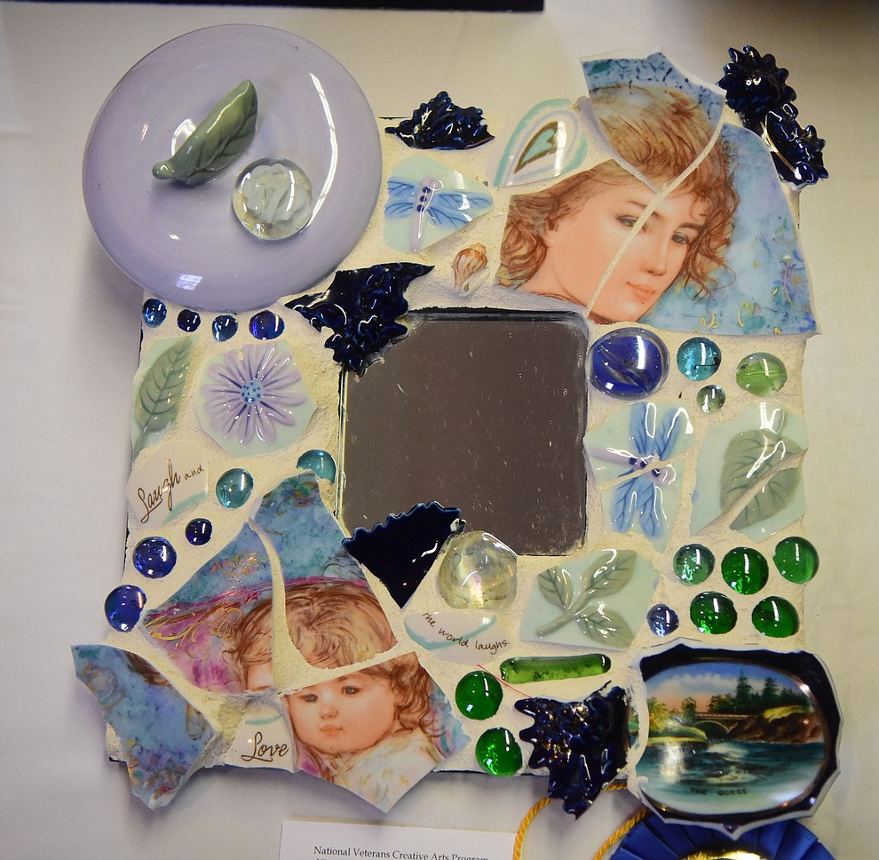 Rocksanne Topping created this mosaic called Like Mother Like Daughter and it's on display at the Prescott VA Veteran's Creative Arts Festival Wednesday, Feb. 13, 2019. 128 pieces are on display at the 25th annual show being held in Building 15, theatre. (Les Stukenberg/Courier).