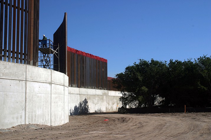 Construction and repair of sections of the border wall are ongoing, like this levee-border wall at Hidalgo Pumphouse World Birding Center in Texas. But President Donald Trump declared a national emergency to divert $6.6 billion to wall building this year, in addition to the $1.375 billion Congress approved. (Scott Nicol, Center for Biological Diversity/Courtesy)