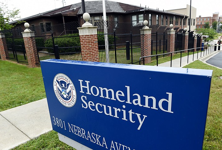 In this June 5, 2015, file photo, the Homeland Security Department headquarters in northwest Washington. The Trump administration has announced new rules for scrutinizing petitions to bring in minor spouses to the United States. (AP Photo/Susan Walsh, File)