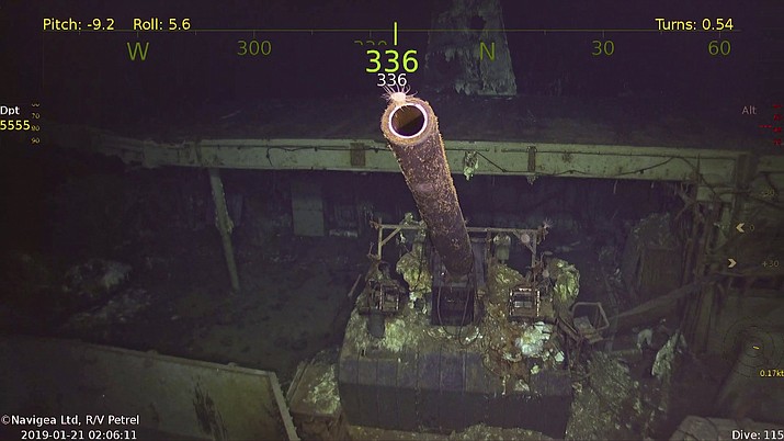 This photo provided by Paul G. Allen’s Vulcan Inc. shows a five inch gun at the wreckage of the USS Hornet. A research vessel funded by the late Seattle billionaire Paul Allen has discovered the wreckage of the aircraft carrier sunk in the South Pacific during World War II. Allen's Vulcan Inc. announced this week of Feb. 10, 2019, that an autonomous submarine sent by the crew of the research vessel Petrel found the USS Hornet nearly 17,500 feet (5,400 meters) deep near the Solomon Islands. The Hornet was best known for its part in the Doolittle Raid in April 1942, the first air attack on Japan. (Paul G. Allen’s Vulcan Inc. via AP)