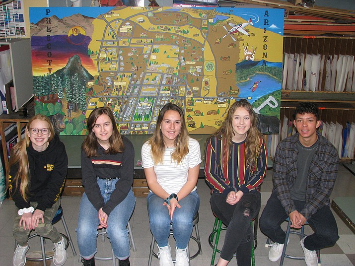 Students from advanced art classes at Prescott High School recently completed this mural of the city of Prescott. The artwork now hangs in City Hall. (PUSD/Courtesy)