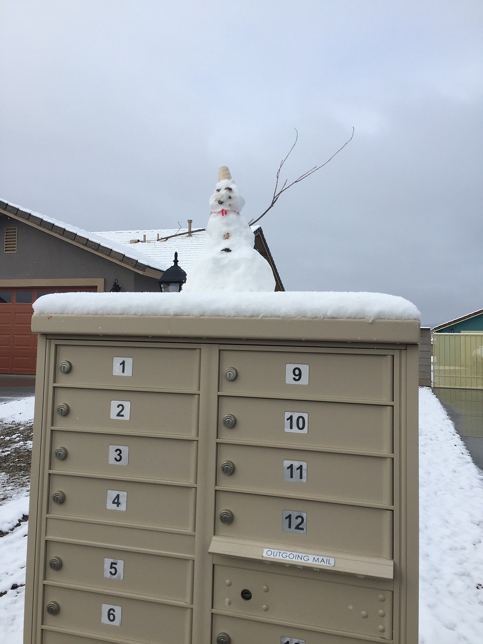 M. Myers and family took time to build a snowman on their mailbox. (Submitted photo by M. Meyers)