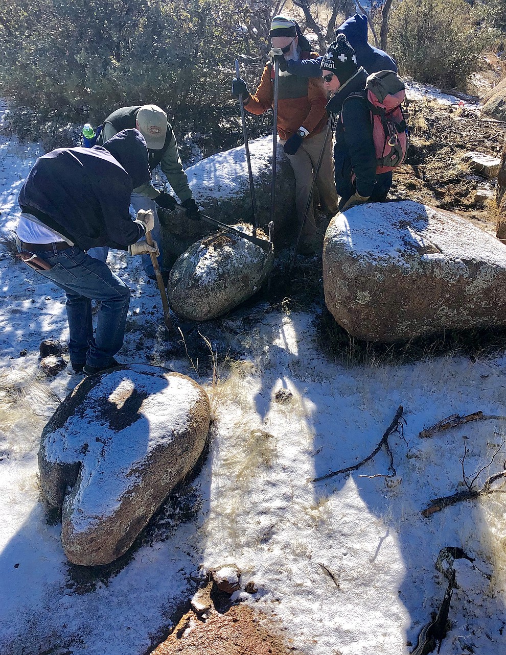 Volunteers with the trail-building group, the Over the Hill Gang, were out recently building the final 0.2-mile section of the Storm Ranch Trails in the Granite Dells. Over the past year, the volunteers, along with Prescott Trails and Natural Parklands Coordinator Chris Hosking, have put about 5,500 hours of work into building the total 6.4 miles of Storm Ranch Trails. (Cindy Barks/Courier)