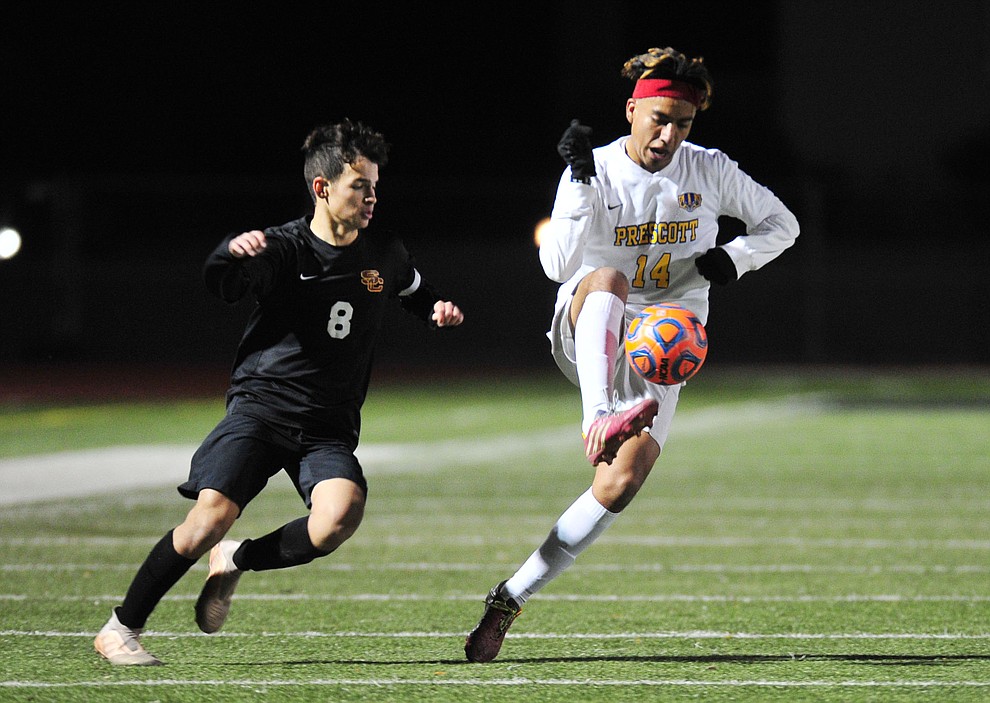 Prescott's Fernando Rodriguez battles for the ball as the Badgers take on the Salpointe Catholic Lancers in the Arizona Interscholastic Association 4A State Soccer Championship Tuesday, February 19, 2019 at Williams Field High School in Gilbert. (Les Stukenberg/Courier).