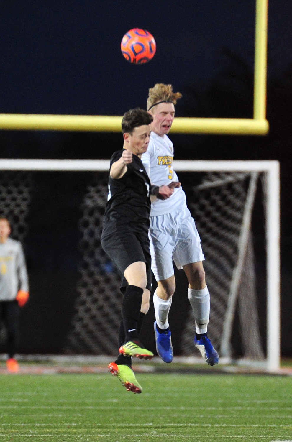 Prescott's Mathew Kaitschuck heads the ball as the Badgers take on the Salpointe Catholic Lancers in the Arizona Interscholastic Association 4A State Soccer Championship Tuesday, February 19, 2019 at Williams Field High School in Gilbert. (Les Stukenberg/Courier).