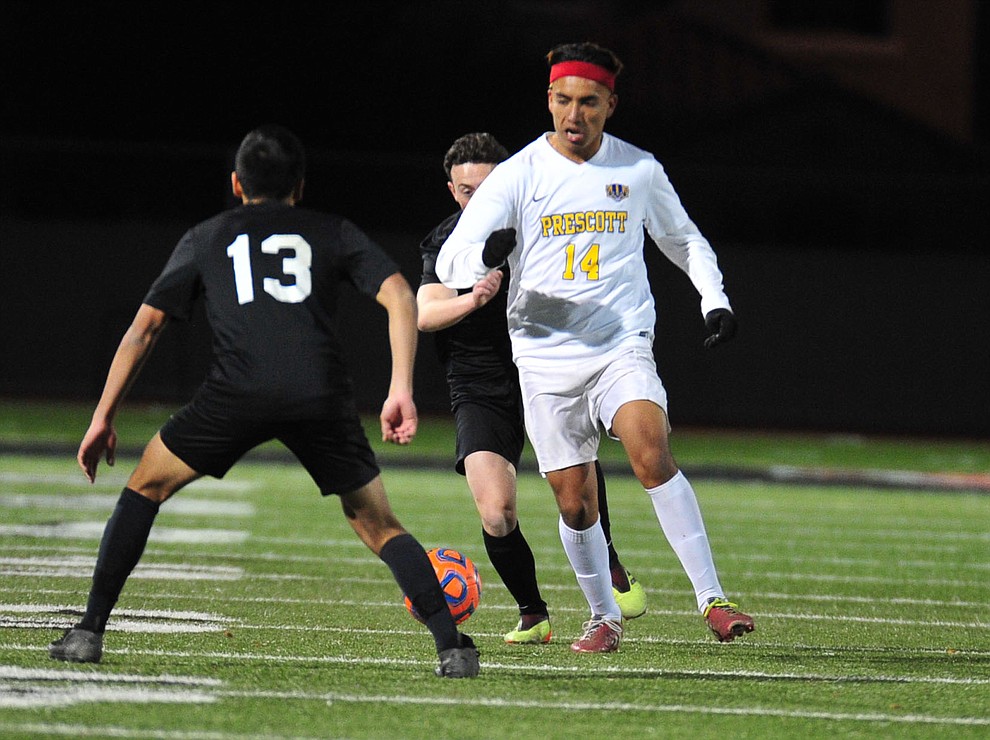 Prescott's Fernando Rodriguez brings the ball upfield as the Badgers take on the Salpointe Catholic Lancers in the Arizona Interscholastic Association 4A State Soccer Championship Tuesday, February 19, 2019 at Williams Field High School in Gilbert. (Les Stukenberg/Courier).