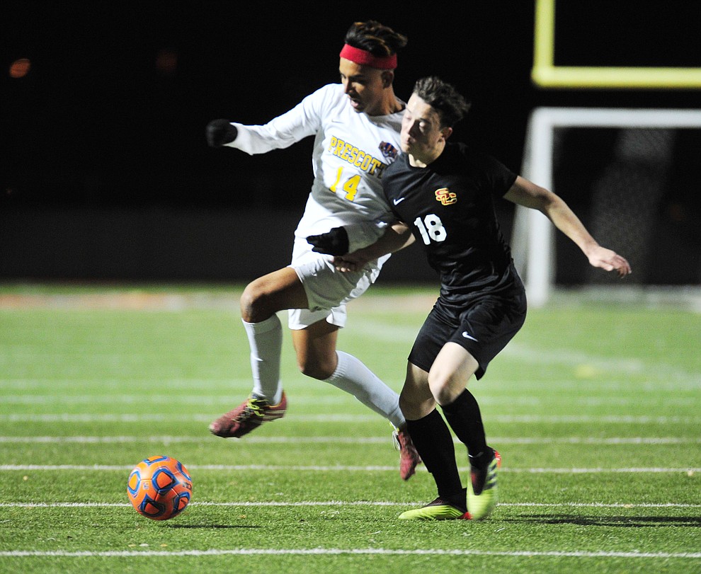 Prescott's Fernando Rodriguez battles for the ball as the Badgers take on the Salpointe Catholic Lancers in the Arizona Interscholastic Association 4A State Soccer Championship Tuesday, February 19, 2019 at Williams Field High School in Gilbert. (Les Stukenberg/Courier).