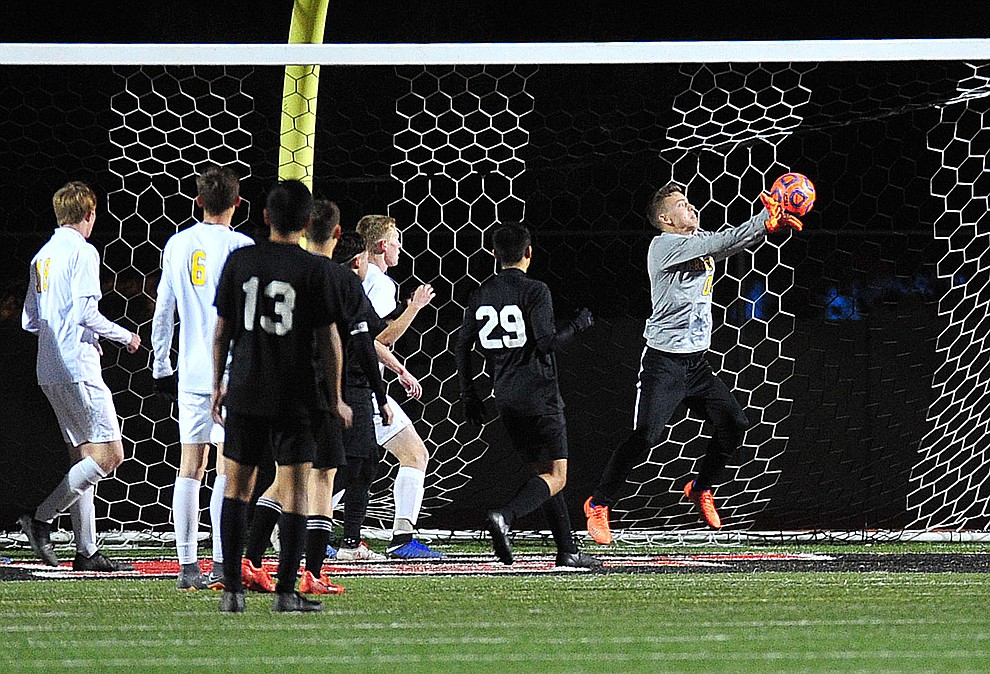 Prescott's Tobias Buettner makes a stop as the Badgers take on the Salpointe Catholic Lancers in the Arizona Interscholastic Association 4A State Soccer Championship Tuesday, February 19, 2019 at Williams Field High School in Gilbert. (Les Stukenberg/Courier).