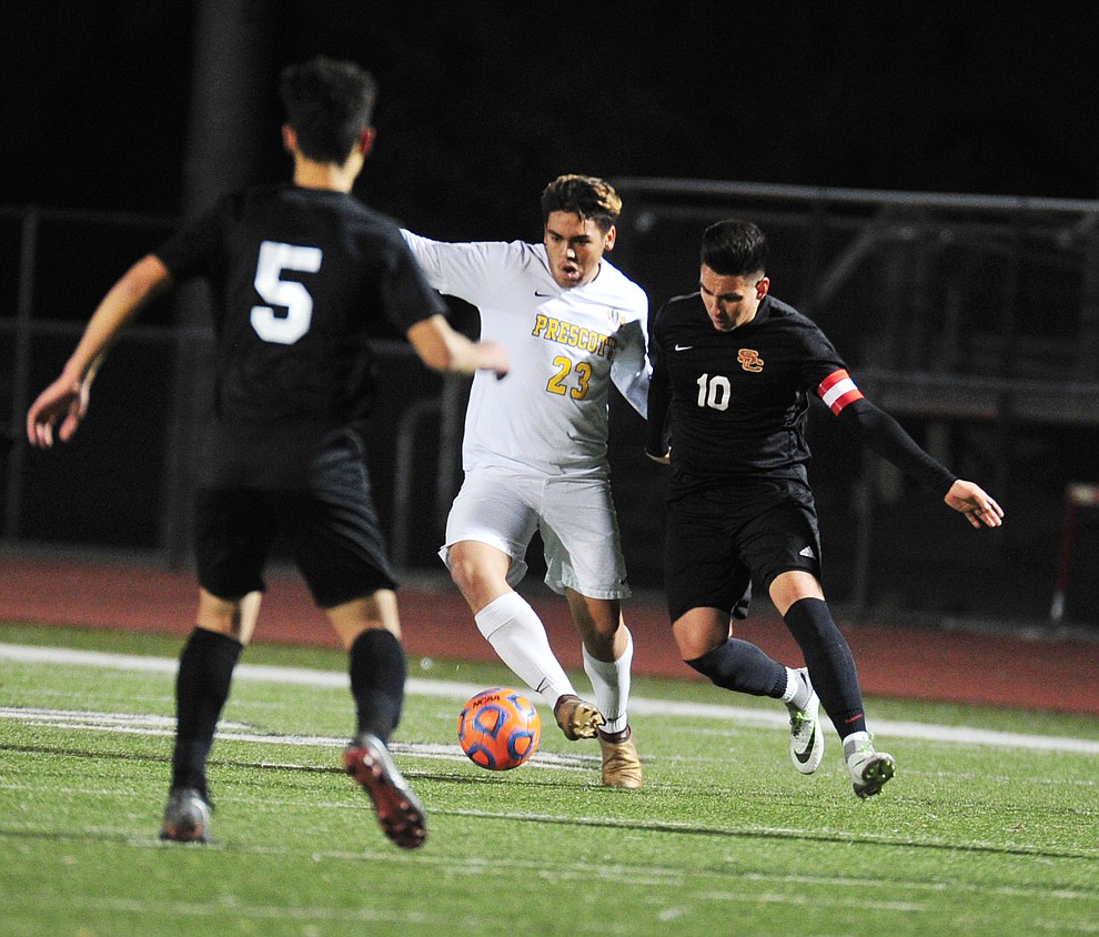 Prescott's Bryant Chavira battles for the ball as the Badgers take on the Salpointe Catholic Lancers in the Arizona Interscholastic Association 4A State Soccer Championship Tuesday, February 19, 2019 at Williams Field High School in Gilbert. (Les Stukenberg/Courier).