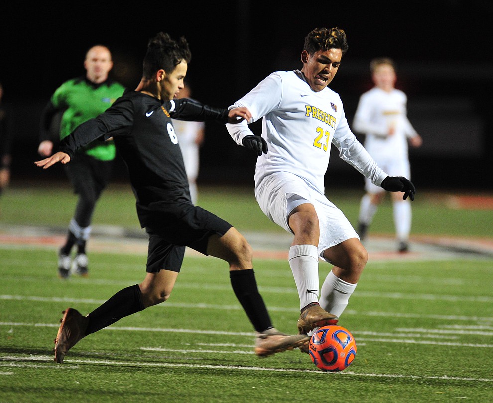 Prescott's Bryant Chavira battles for the ball as the Badgers take on the Salpointe Catholic Lancers in the Arizona Interscholastic Association 4A State Soccer Championship Tuesday, February 19, 2019 at Williams Field High School in Gilbert. (Les Stukenberg/Courier).