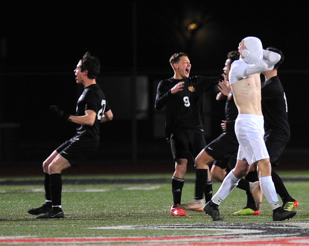 A Prescott player covers his head as the Badgers fell to the Salpointe Catholic Lancers 2-1 in the Arizona Interscholastic Association 4A State Soccer Championship Tuesday, February 19, 2019 at Williams Field High School in Gilbert. (Les Stukenberg/Courier).
