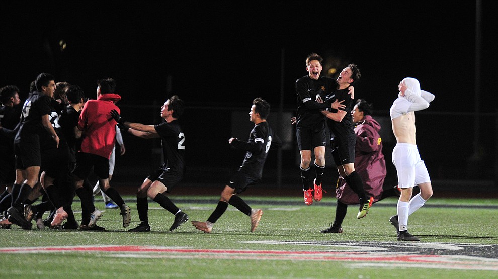 A Prescott player covers his head as the Badgers fell to the Salpointe Catholic Lancers 2-1 in the Arizona Interscholastic Association 4A State Soccer Championship Tuesday, February 19, 2019 at Williams Field High School in Gilbert. (Les Stukenberg/Courier).