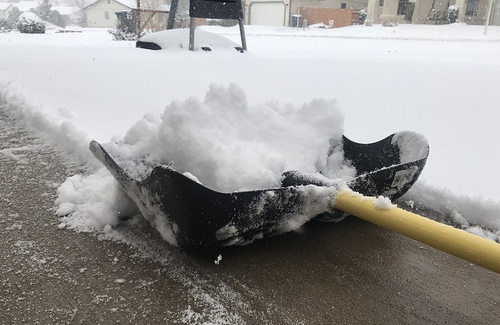 Shoveling early may have been in vain as the predicted snowfall Thursday, Feb. 21, 2019 hit the Prescott Valley area. (Les Stukenberg/Courier).