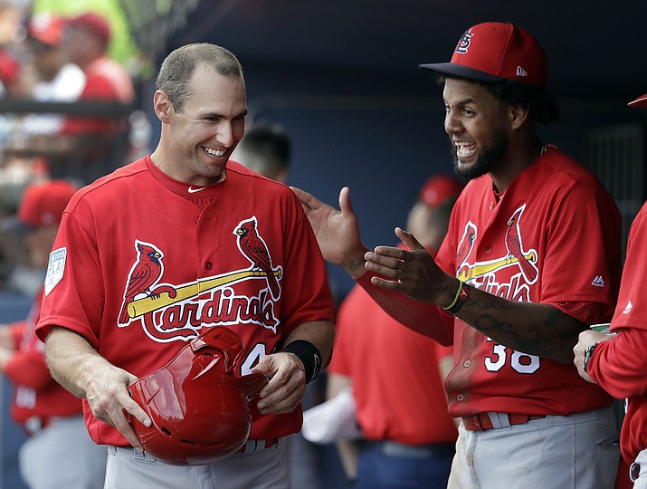 St. Louis Cardinals’ Paul Goldschmidt, left, laughs with Jose Martinez in the dugout during the fifth inning of an spring training game against the Washington Nationals on Tuesday, Feb. 26, 2019, in West Palm Beach, Fla. (Jeff Roberson/AP)