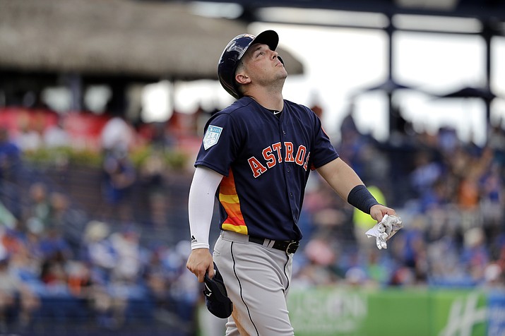 Houston Astros' Alex Bregman looks up as he walks to first after being hit by a pitch during the fifth inning of an exhibition spring training game against the New York Mets Saturday, March 2, 2019, in Port St. Lucie, Fla. (Jeff Roberson/AP)