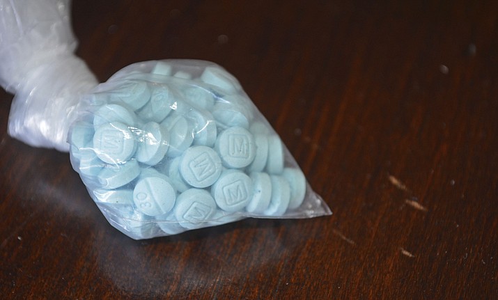 This undated photo provided by the U.S. Drug Enforcement Administration’s Phoenix Division shows a closeup of the fentanyl-laced sky blue pills known on the street as “Mexican oxy.” Smuggled in from Mexico, these mimic the prescription drug oxycodone. (Drug Enforcement Administration via AP)