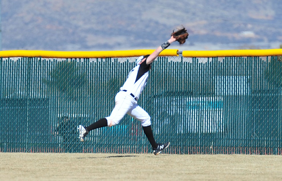 Bradshaw Mountain's Jordan Massis gets the catch in deep center field as the Bears host the Flagstaff Eagles Tuesday, March 5, 2019 in Prescott Valley. (Les Stukenberg/Courier)