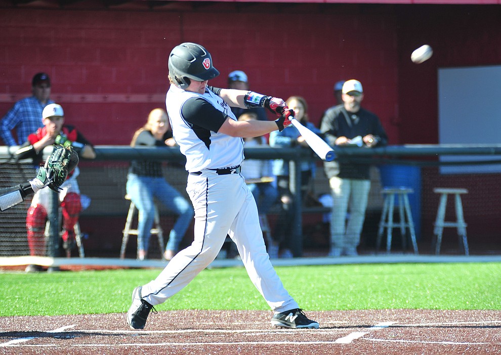 Bradshaw Mountain's Jacob Roberts hits a double as the Bears host the Flagstaff Eagles Tuesday, March 5, 2019 in Prescott Valley. (Les Stukenberg/Courier)
