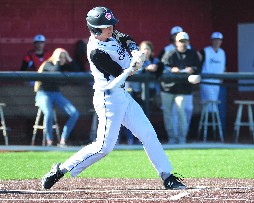 Bradshaw Mountain's Josh Grant hits a double as the Bears host the Flagstaff Eagles Tuesday, March 5, 2019 in Prescott Valley. (Les Stukenberg/Courier)