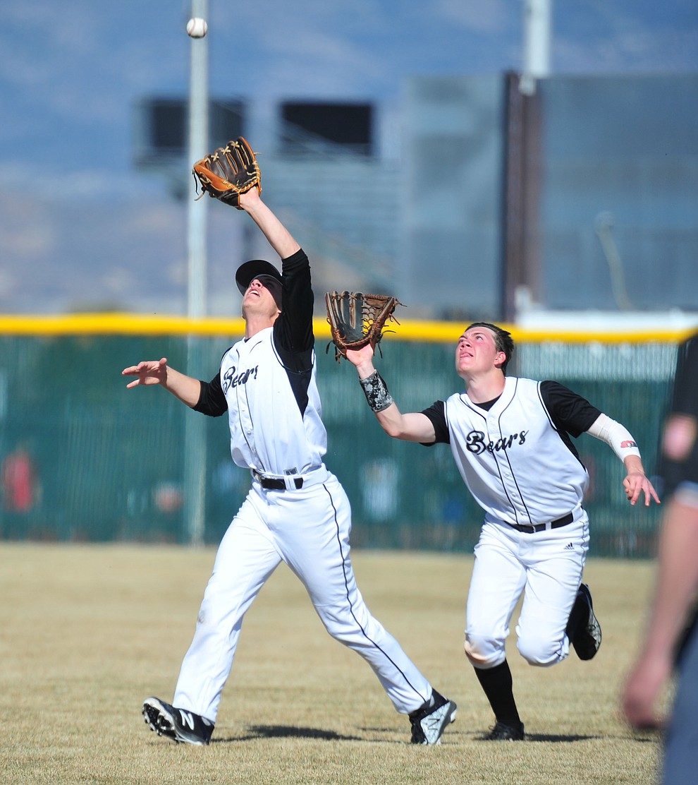 Bradshaw Mountain's Josh Grant and Jordan Massis go for a shallow fly ball as the Bears host the Flagstaff Eagles Tuesday, March 5, 2019 in Prescott Valley. (Les Stukenberg/Courier)