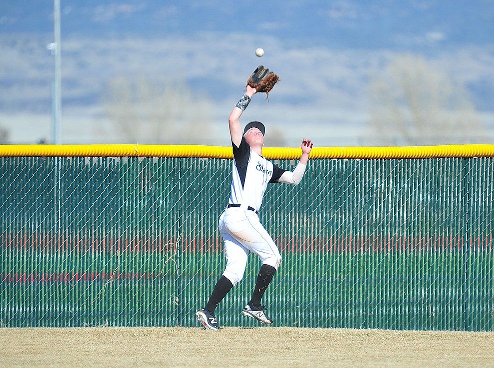 Bradshaw Mountain's Jordan Massis has his eye on the ball in deep center field as the Bears host the Flagstaff Eagles Tuesday, March 5, 2019 in Prescott Valley. (Les Stukenberg/Courier)
